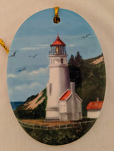 Load image into Gallery viewer, Christmas Ornament- Oval Ceramic Heceta Head Lighthouse
